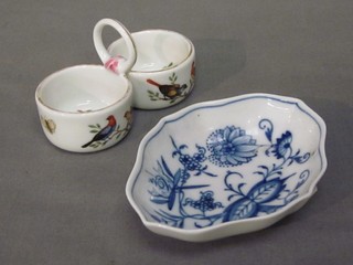 A "Meissen" circular twin division dish decorated birds and an oval blue and white Meissen pin tray 4"
