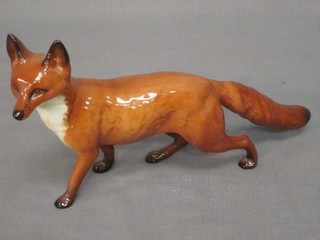 A Beswick figure of a standing fox 8"