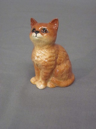 A Beswick figure of a seated cat 4"