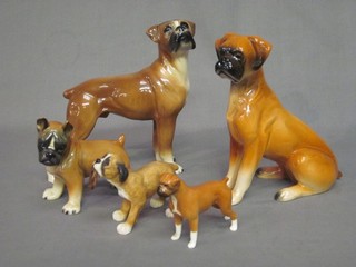 A Beswick figure of a standing Boxer Dog 3", together with 4 other figures of Boxer dogs