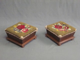 A pair of Victorian square waisted mahogany stools with Berlin woolwork seats 16"