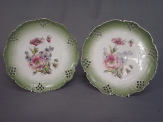 2 circular green ribbonware plates with floral decoration (1 chipped) 9"