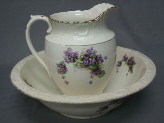 A floral patterned jug and bowl set