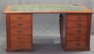 A handsome  "walnut" kneehole pedestal desk  with inset tooled leather writing surface, the pedestal fitted 10 drawers and raised on turned supports 68"