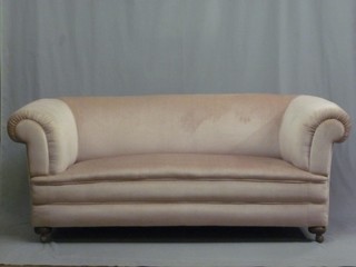 A mahogany framed settee  upholstered in lilac material 73"