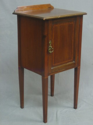 A Maple & Co inlaid mahogany bedside cupboard, raised on square tapering supports