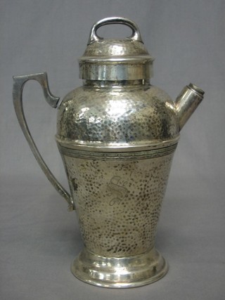An Art Deco silver plated cocktail shaker (missing stopper)