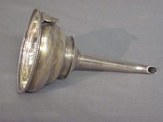 A George III silver wine funnel with armorial decoration, London 1781, 2 ozs