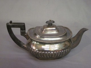 An oval silver plated teapot with demi-reeded decoration by Mappin & Webb