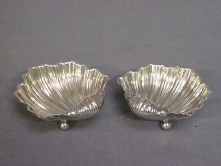 A pair of Victorian silver scalloped salts raised on bun feet Birmingham 1897 2"