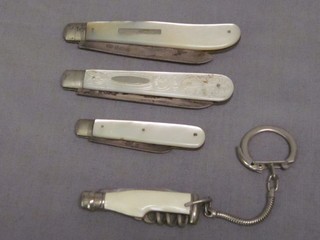 3 silver bladed folding fruit knives with mother of pearl grips and a pocket knife