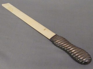 A silver and ivory bladed newspaper opener with silver handle, London 1913 (blade f)