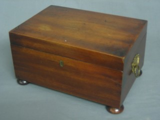 A 19th Century rectangular mahogany trinket box with hinged lid and ring drop handles, raised on bun feet 12"