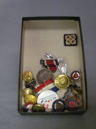 A George VI British War medal, an Edward VII School Attendance medal, a French Foreign Legion button, other buttons etc
