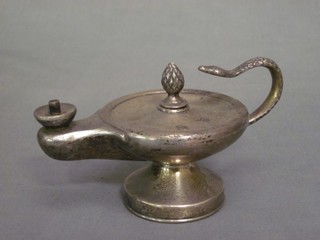 A Victorian silver table lighter in the form of a Grecian oil lamp, London 1895