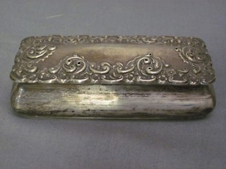 A Victorian rectangular embossed silver trinket box with hinged lid, Birmingham 1897 (some holes to the lid) 2 ozs
