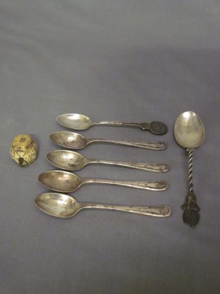 A carved ivory pendant and 6 various teaspoons