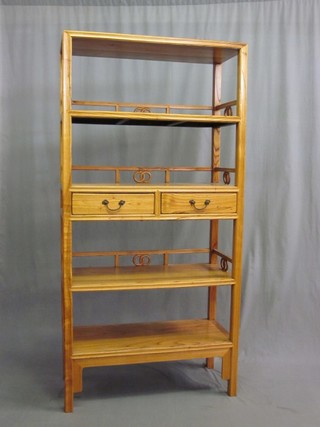 An Eastern light hardwood 4 tier what-not/side cabinet fitted 2 long drawers 35"