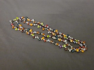 A rope of multi-coloured pearls