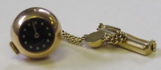 A lady's Asprey ball shaped fob watch contained in an 18ct gold case