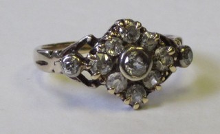 A shaped gold dress ring set diamonds