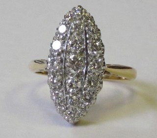 A lady's 18ct gold marquise shaped dress ring set numerous diamonds