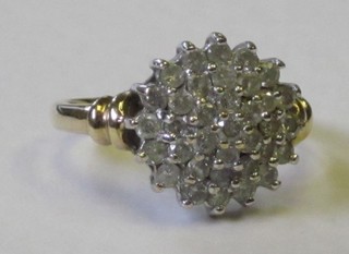 A lady's 9ct yellow gold cluster dress ring set diamonds