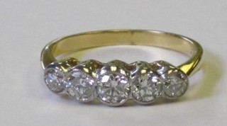 An 18ct yellow gold dress ring set 5 diamonds, approx. 0.85ct