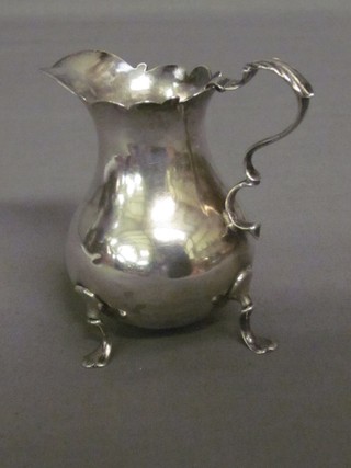 A George II silver cream jug, London 1756 3 ozs