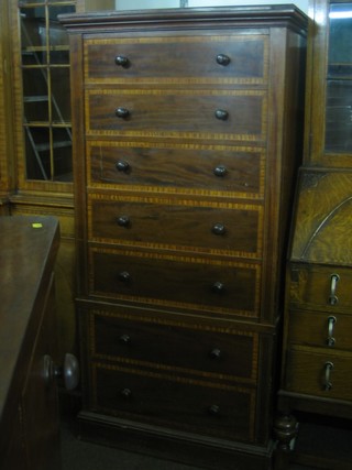 A Victorian mahogany safe cabinet in the form of a chest of 7 long drawers, the base fitted 2 long drawers, raised on a platform base 30"