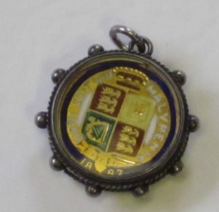 A Victorian 1897 enamelled shield back sovereign mounted as a pendant