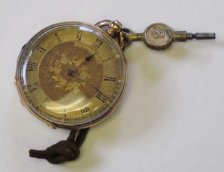 An open faced pocket watch contained in a gold case