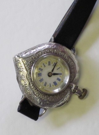 A lady's heart shaped wristwatch contained in a silver case
