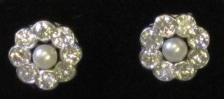 A pair of circular cluster ear studs set pearls surrounded by diamonds approx 1.50ct