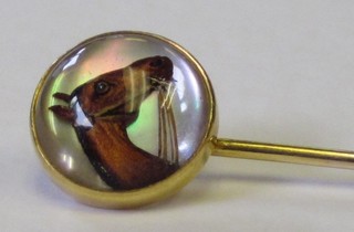 A 19th Century gilt metal and rock crystal stick pin decorated a horses head