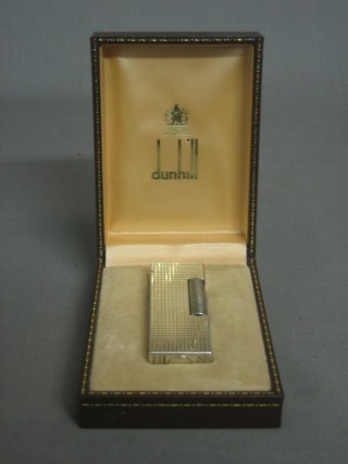 A Dunhill silver plated lighter, cased