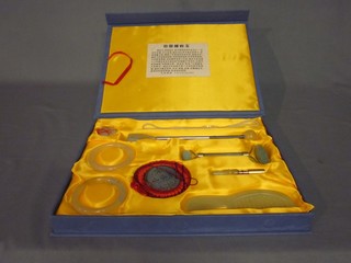 A National "Jade" Anshang Liaoning dressing table set, cased