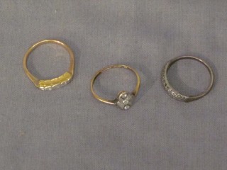 2 gold dress rings and 1 other