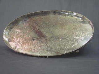 An oval engraved silver plated galleried tea tray 20"