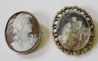 A shell carved cameo portrait brooch of a lady and 1 other