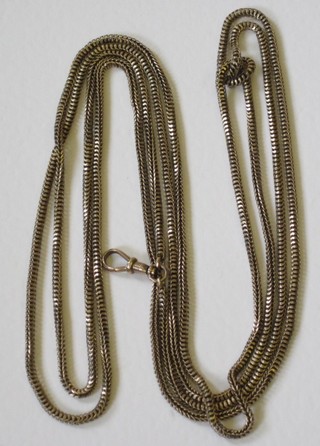 A long gilt metal guard chain