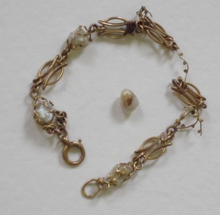 A gilt metal bracelet set seed pearls
