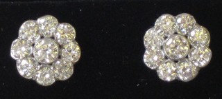 A pair of circular cluster earrings set numerous diamonds, approx 1.80ct