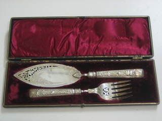 A pair of silver plated fish servers, cased