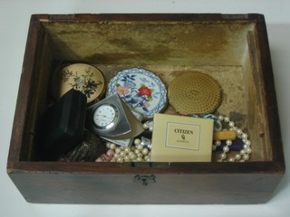 A Victorian mahogany trinket box containing various commemorative crowns, compacts, costume jewellery etc