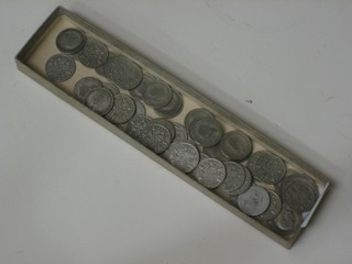 A collection of silver sixpences