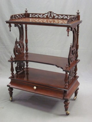 A Victorian style 3 tier mahogany what-not with pierced three-quarter gallery, the base fitted a drawer and raised on turned supports 26"