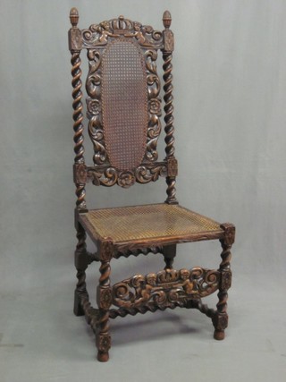 A Victorian Carolean style carved oak high back hall chair with woven rush seat and back, raised on spiral turned supports