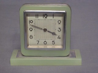 An Art Deco 8 day bedroom timepiece with square dial contained in a green hardstone case 6"