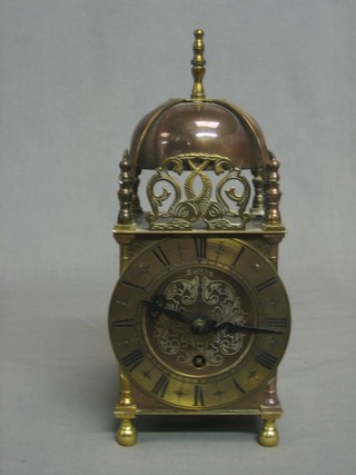 A 1950's Smiths lantern clock contained in a brass case 4"